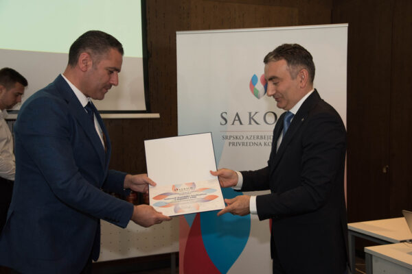38 Representative of the Embassy of the Republic Azerbaijan to the Republic of Serbia, Mr. Habib Mammadov, receiving the certificate of appreciation and Duboki Potok Monastery’s brandy (rakija).